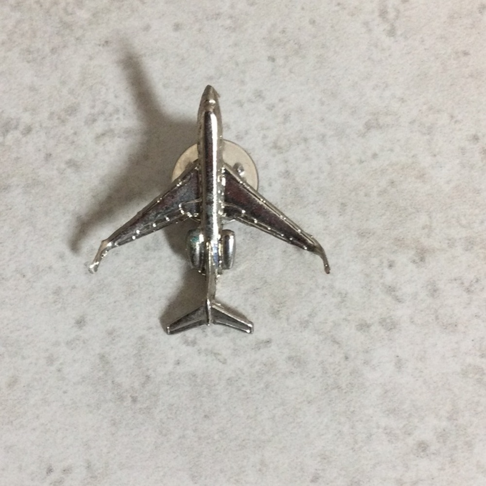 Vintage silver airplane pin